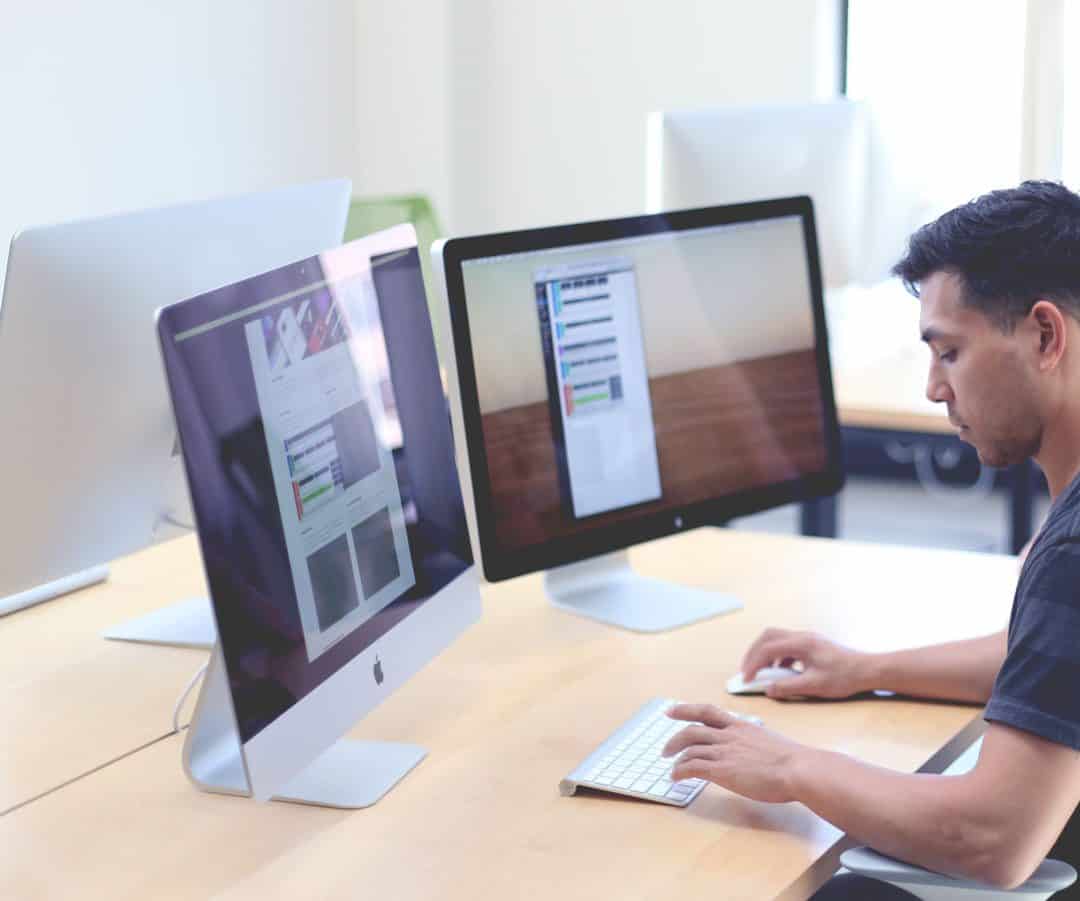 Web developer building and testing a business website